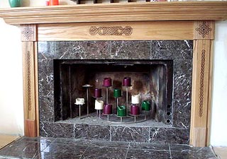 Celtic knots woodburned on fireplace